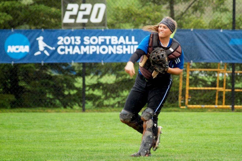 Emily Wallace playing softball in 2013.